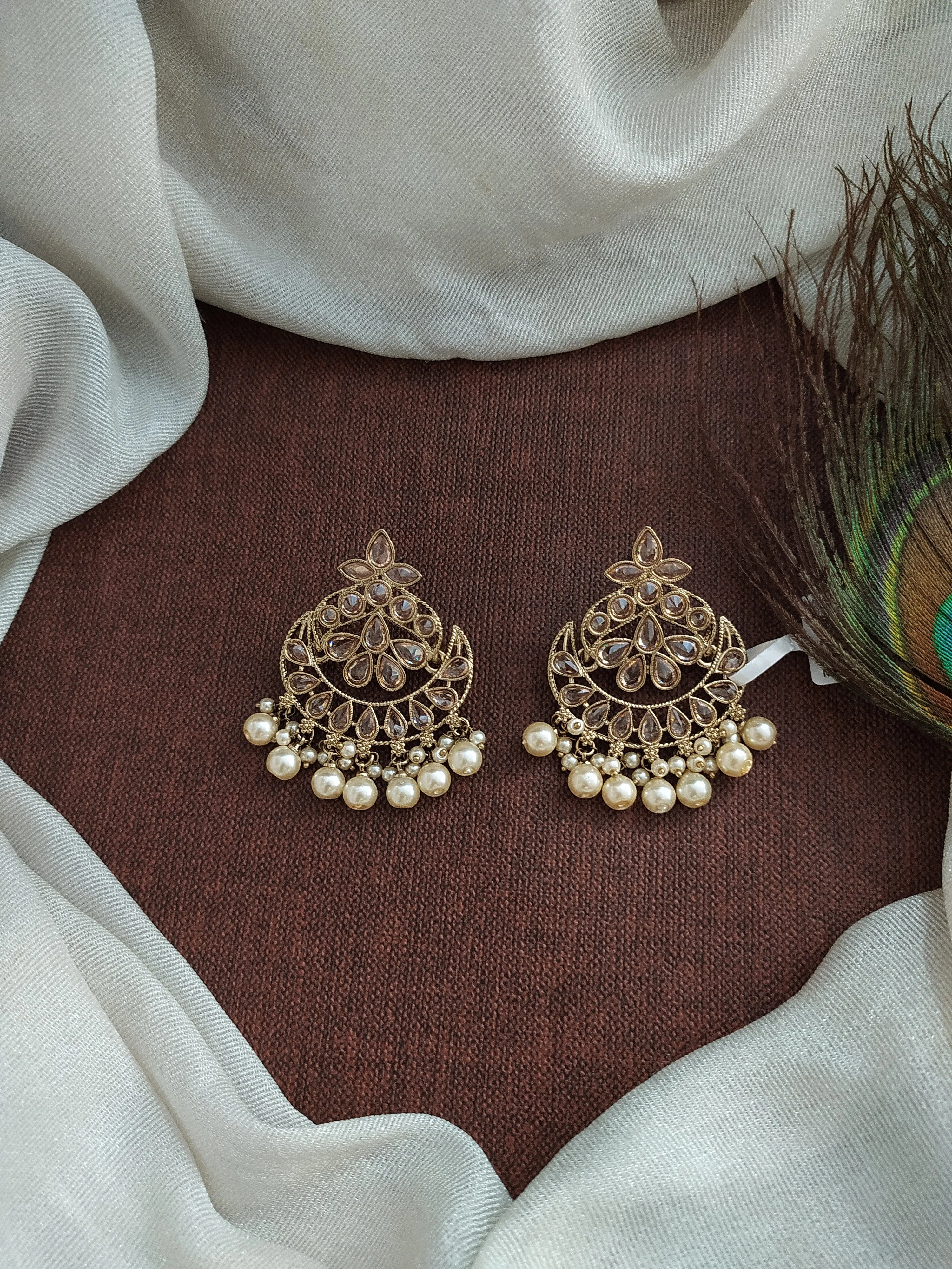 Enchanting Elegance The Uncut Polki Stone Dazzling Mehendi Earrings