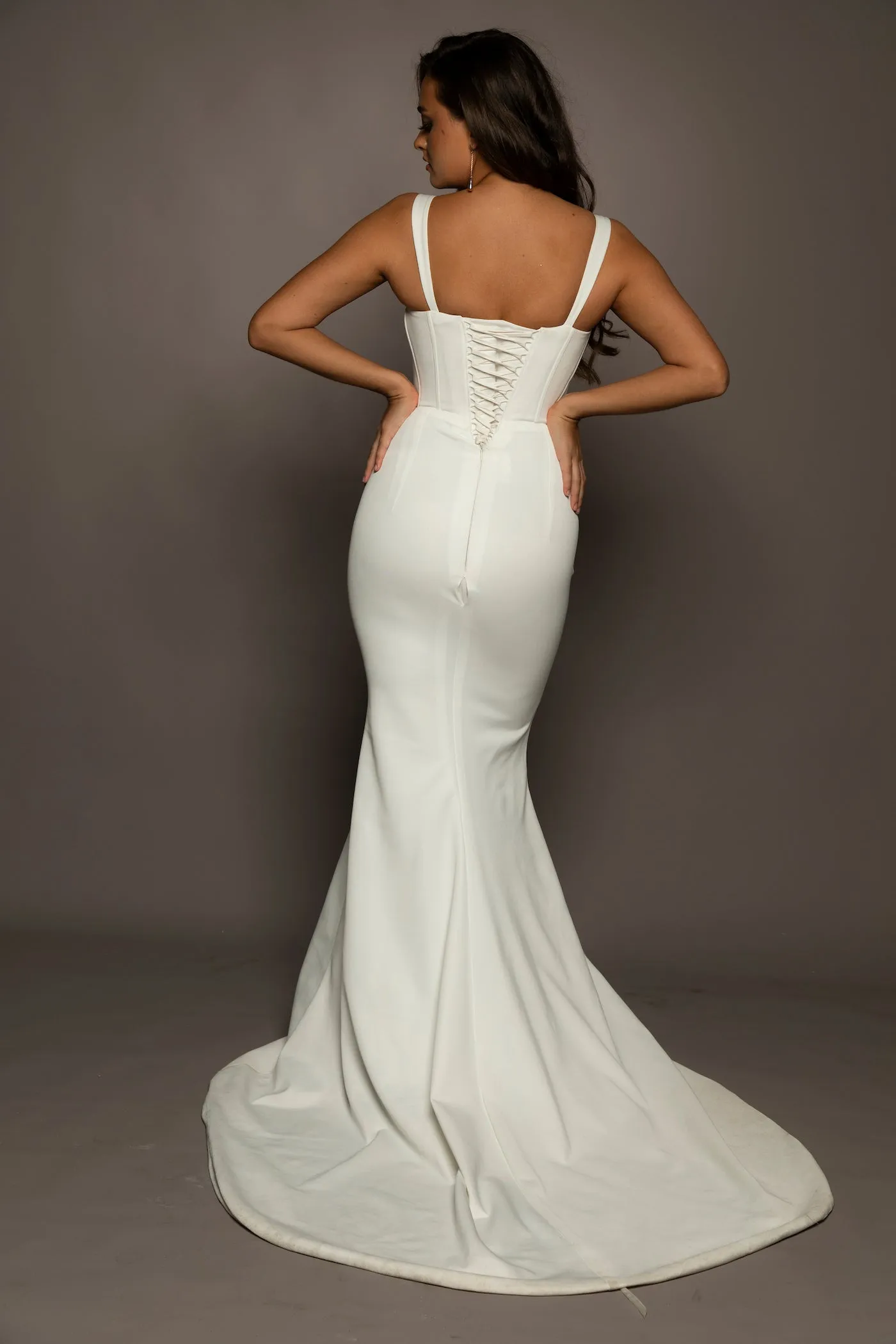 White bustier mermaid dress with lace up back